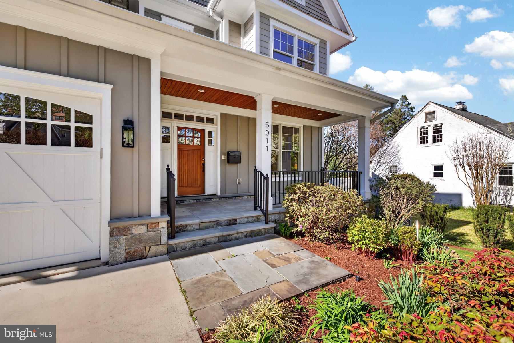 5011 Rugby Avenue Bethesda, MD 20814 - Photo 59 of 65 a front view of a house with garden
