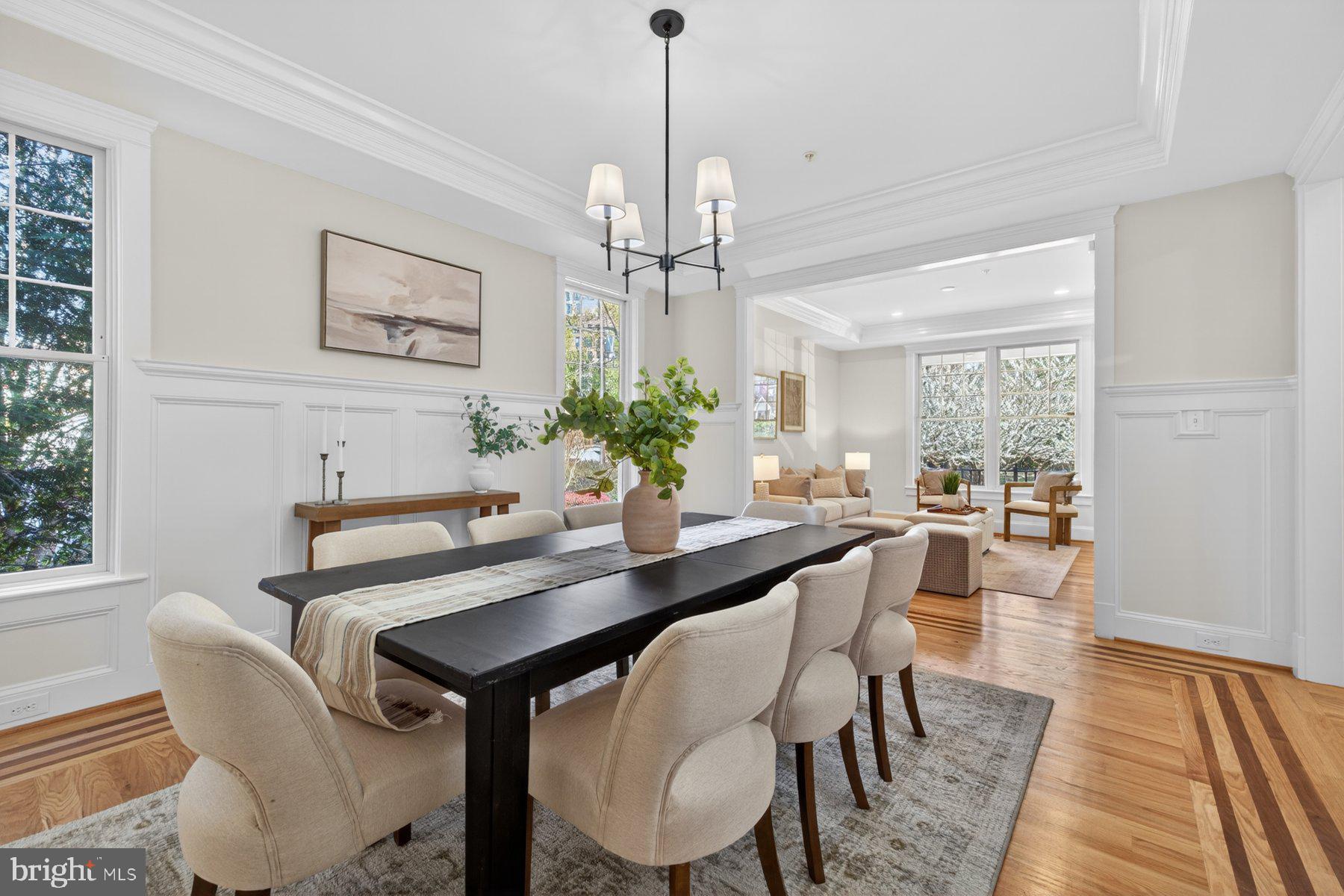 5011 Rugby Avenue Bethesda, MD 20814 - Photo 10 of 65 a view of a dining room with furniture window and wooden floor