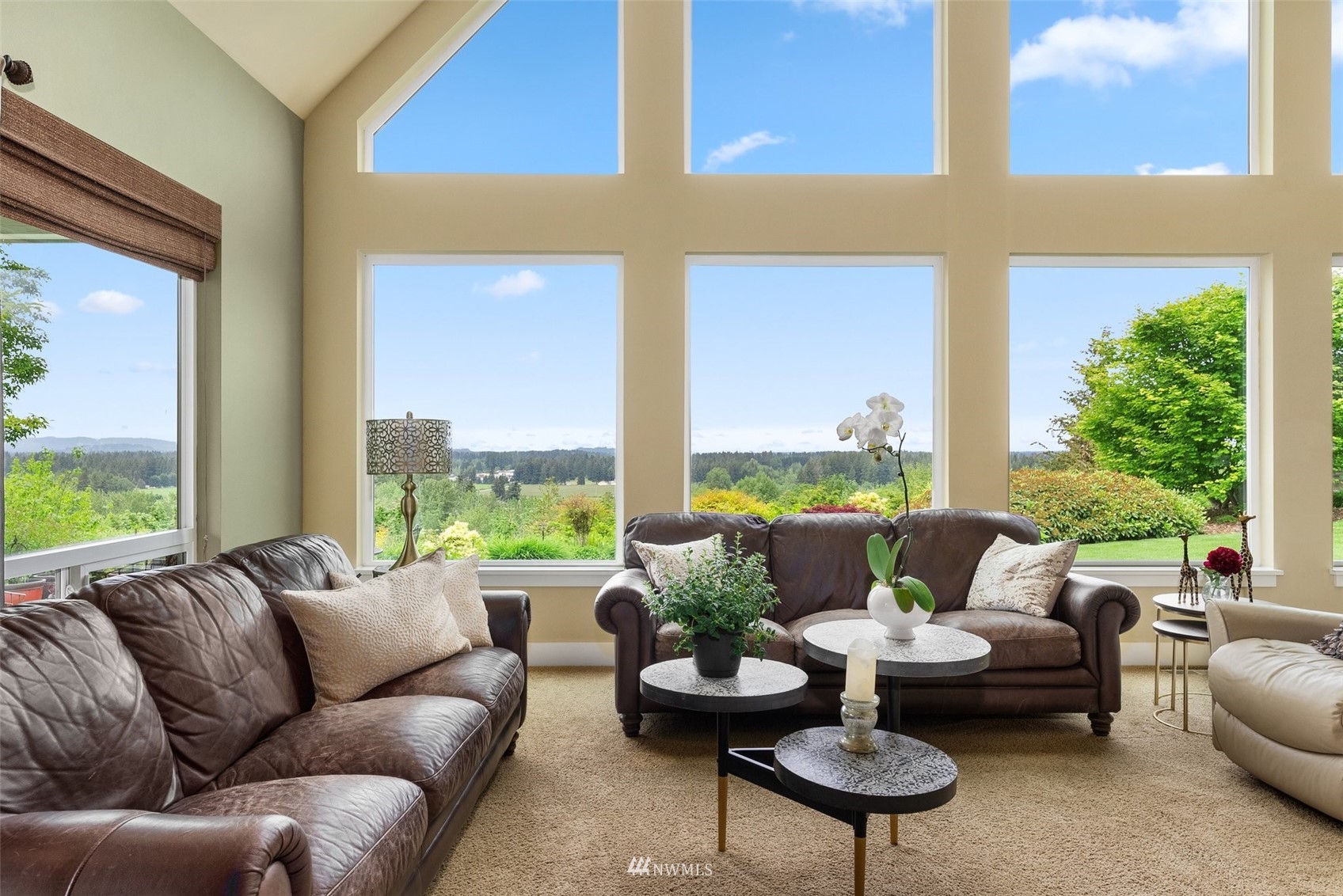 10434 Tilley Road Southwest Olympia, WA 98501 - Photo 12 of 40 a living room with furniture and a large window