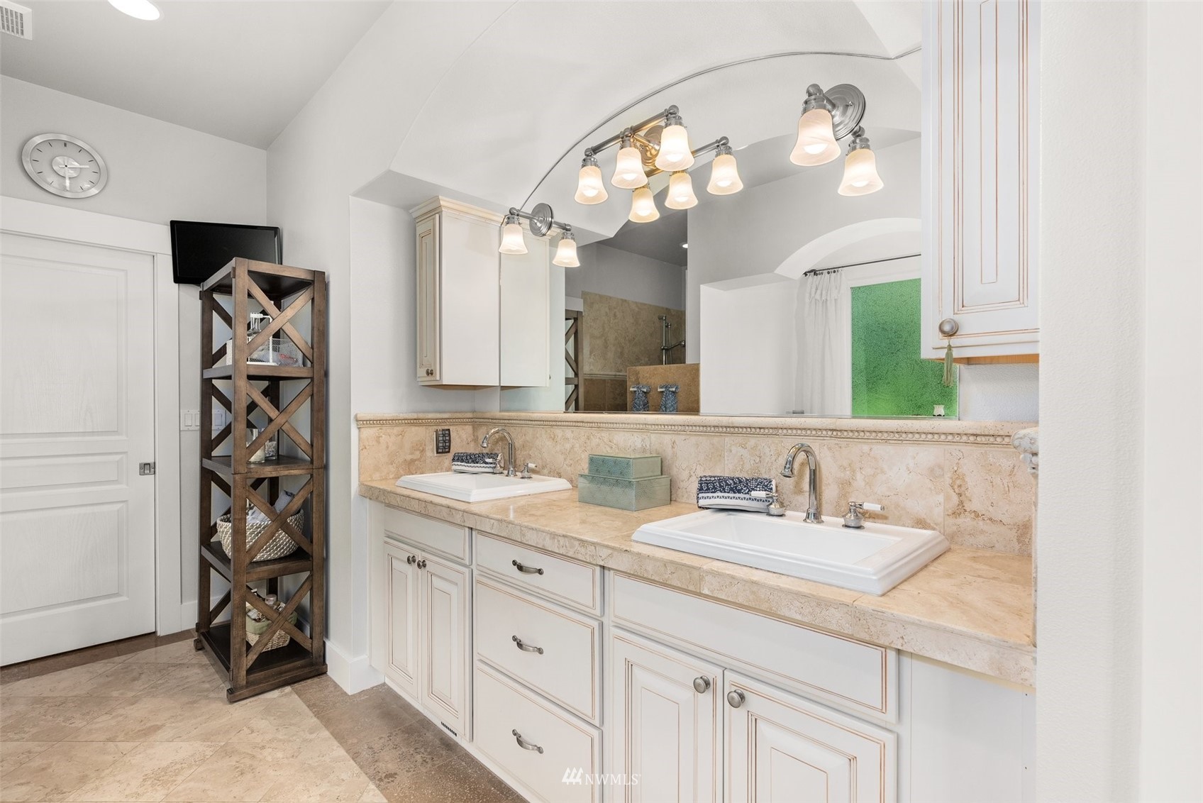 10434 Tilley Road Southwest Olympia, WA 98501 - Photo 21 of 40 a bathroom with a sink vanity and a mirror