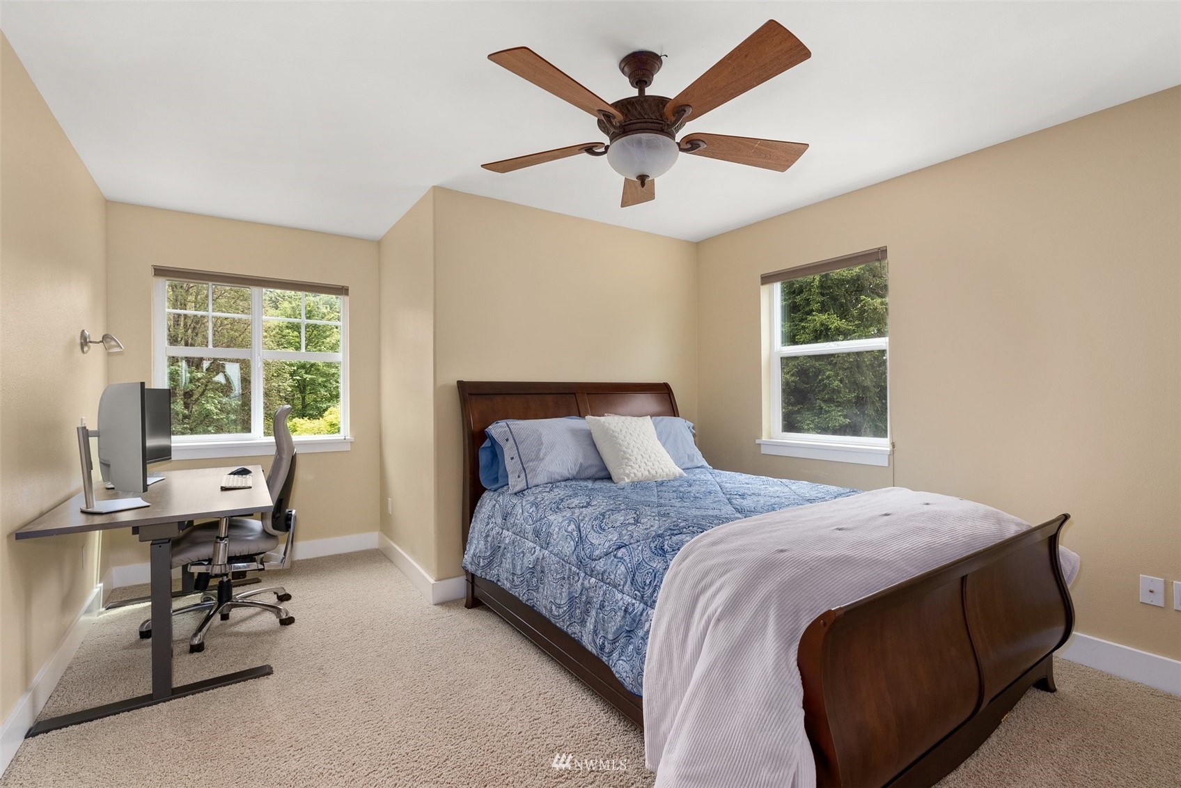 10434 Tilley Road Southwest Olympia, WA 98501 - Photo 28 of 40 a bedroom with a bed and a large window