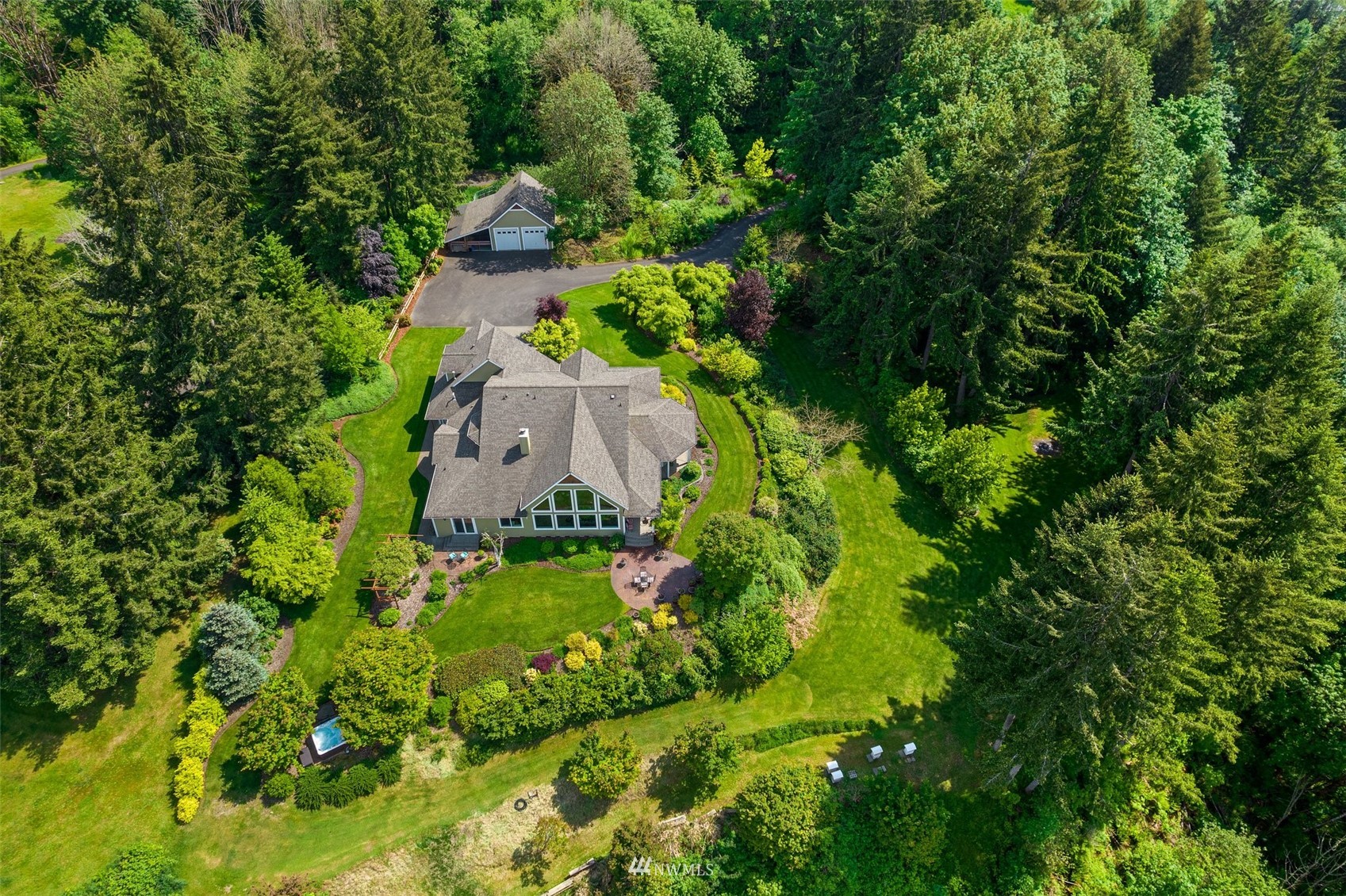 10434 Tilley Road Southwest Olympia, WA 98501 - Photo 3 of 40 an aerial view of a house with a yard and large trees