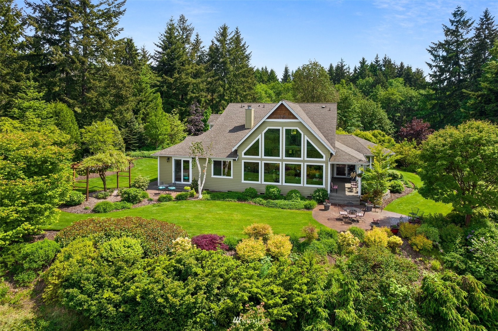10434 Tilley Road Southwest Olympia, WA 98501 - Photo 32 of 40 a front view of a house with a yard