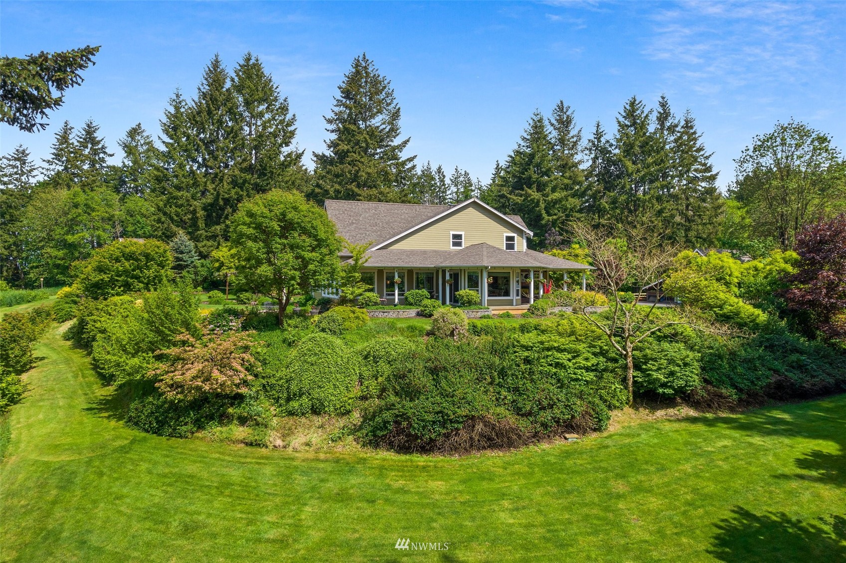 10434 Tilley Road Southwest Olympia, WA 98501 - Photo 34 of 40 a front view of a house with a yard