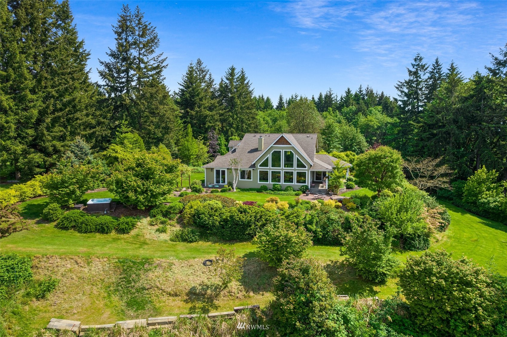 10434 Tilley Road Southwest Olympia, WA 98501 - Photo 35 of 40 a front view of a house with garden