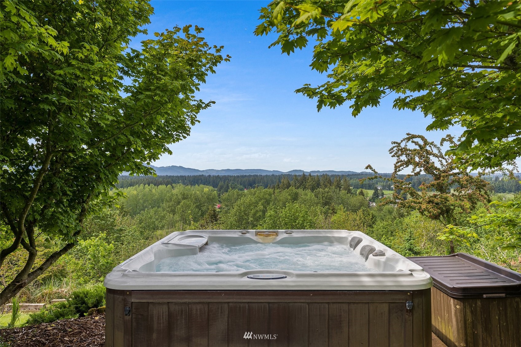 10434 Tilley Road Southwest Olympia, WA 98501 - Photo 38 of 40 a view of a swimming pool with a yard