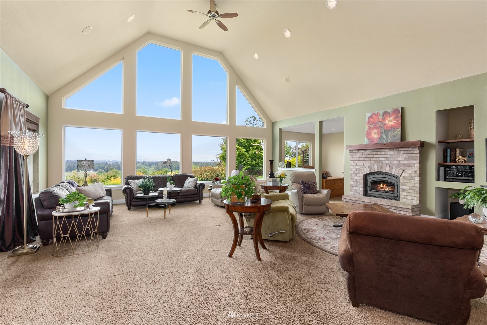 10434 Tilley Road Southwest Olympia, WA 98501 - Photo 6 of 40 a living room with furniture and a fireplace
