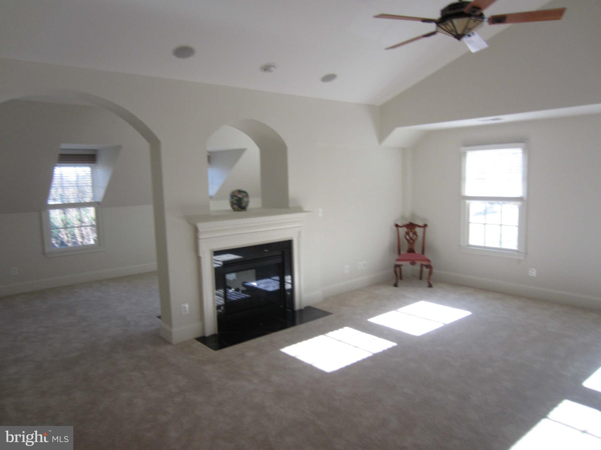 1910 Russell Road Alexandria, VA 22301 - Photo 20 of 25 an empty room with windows and fireplace