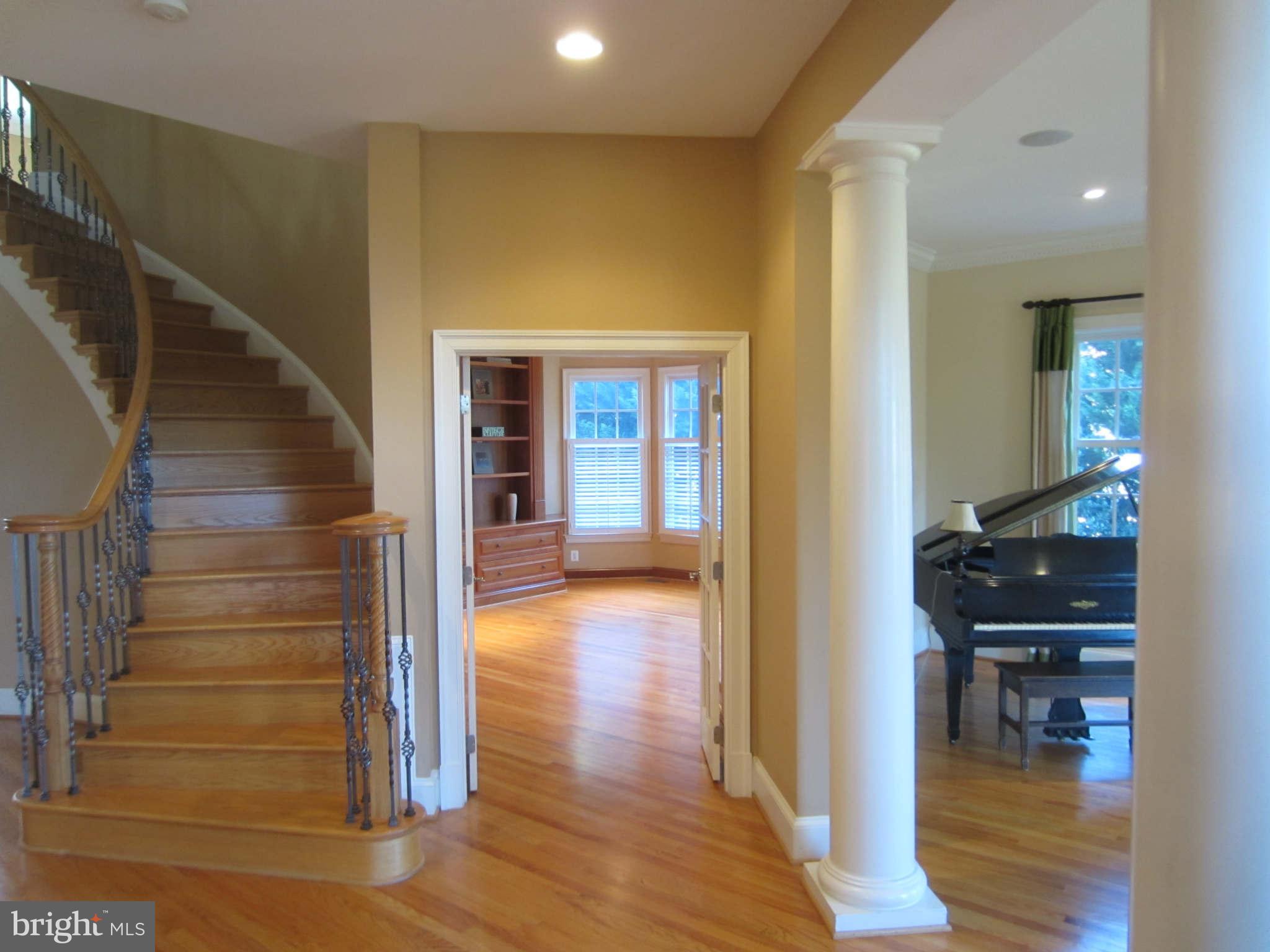 1910 Russell Road Alexandria, VA 22301 - Photo 3 of 25 a view of entryway and hall with wooden floor