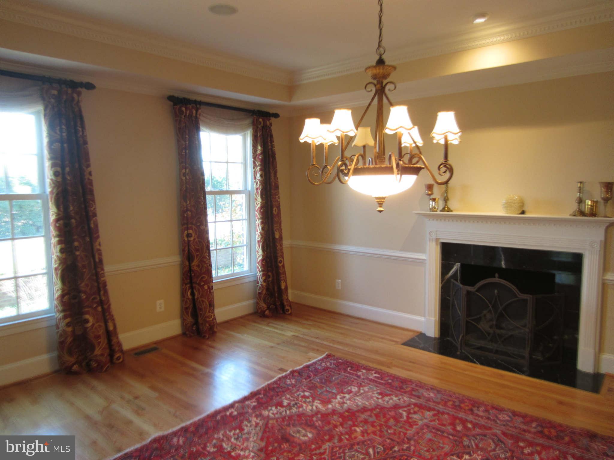 1910 Russell Road Alexandria, VA 22301 - Photo 7 of 25 a view of a livingroom with a fireplace and window