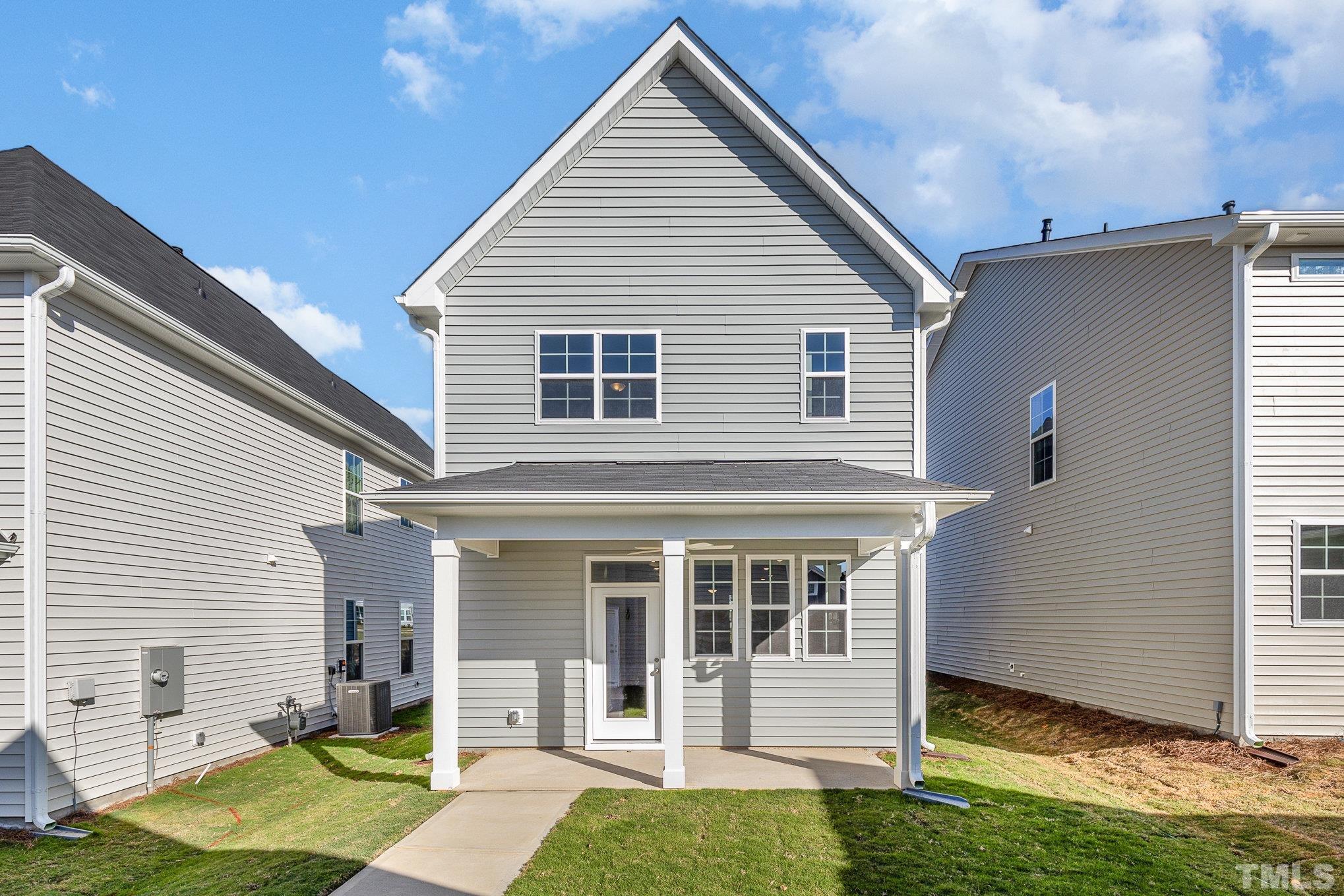 271 Pear Blossom Parkway Clayton, NC 27520 - Photo 23 of 25 a view of a house with backyard