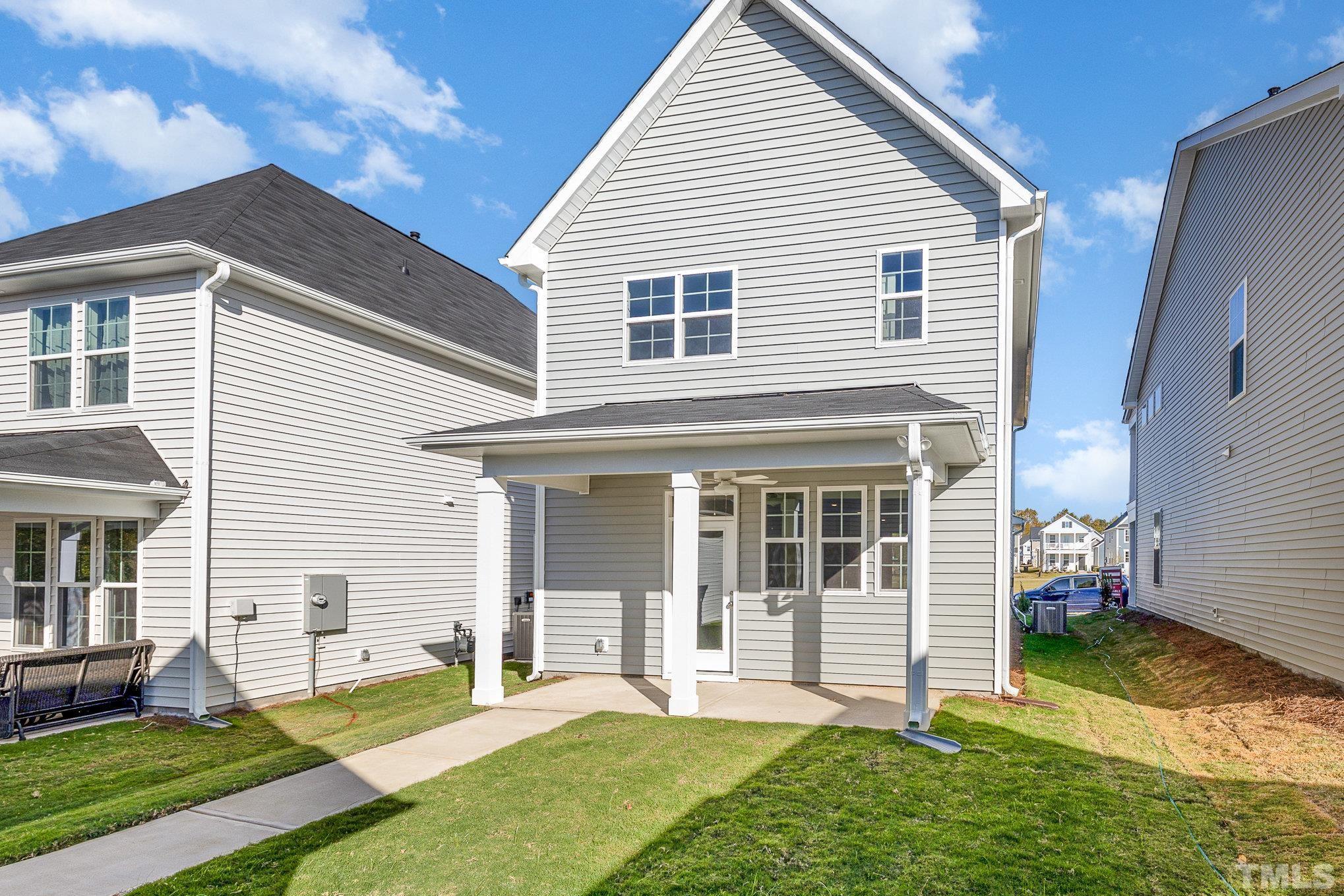 271 Pear Blossom Parkway Clayton, NC 27520 - Photo 24 of 25 a view of house with backyard