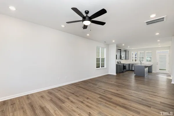 a view of kitchen and kitchen with a sink