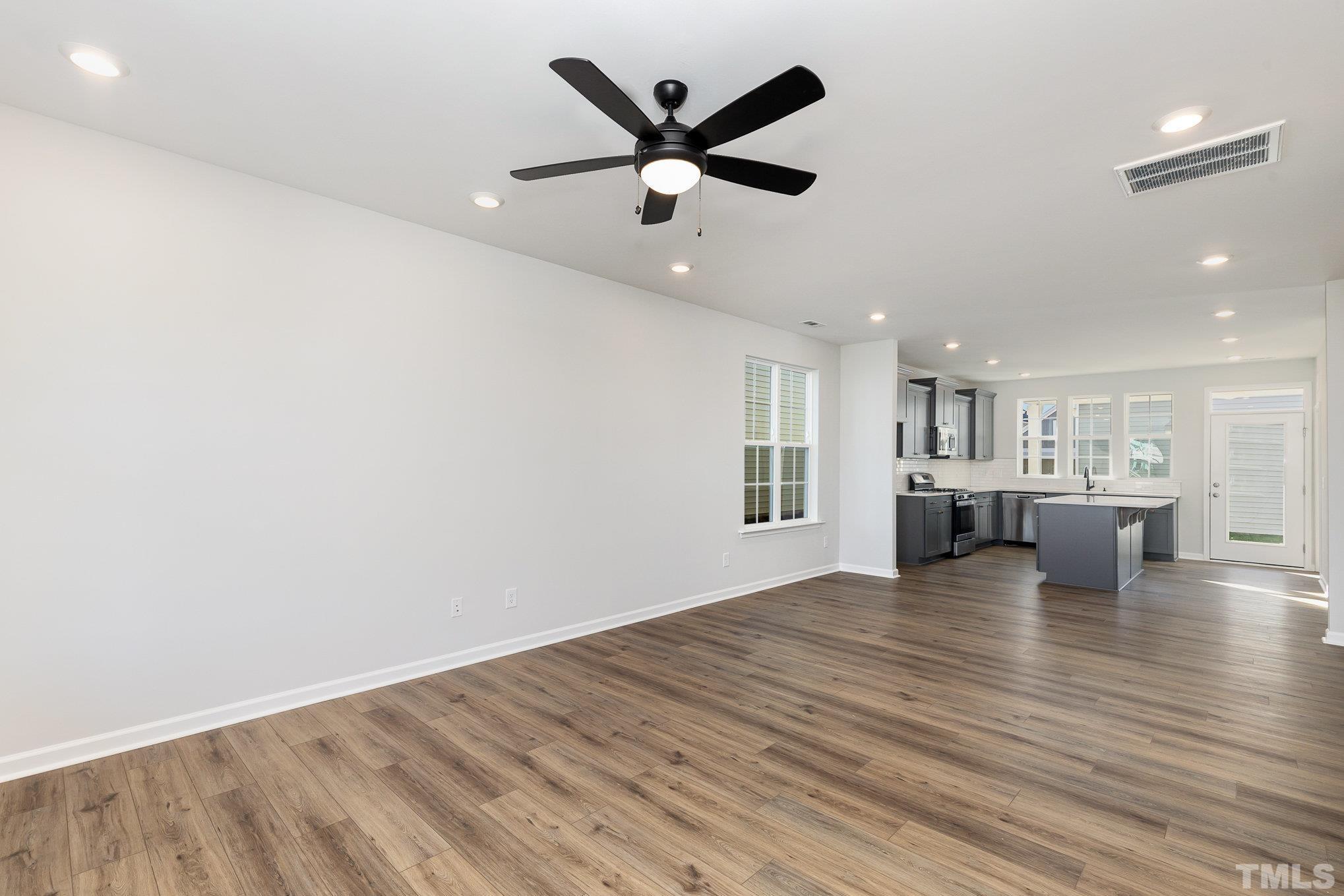 271 Pear Blossom Parkway Clayton, NC 27520 - Photo 4 of 25 a view of kitchen and kitchen with a sink