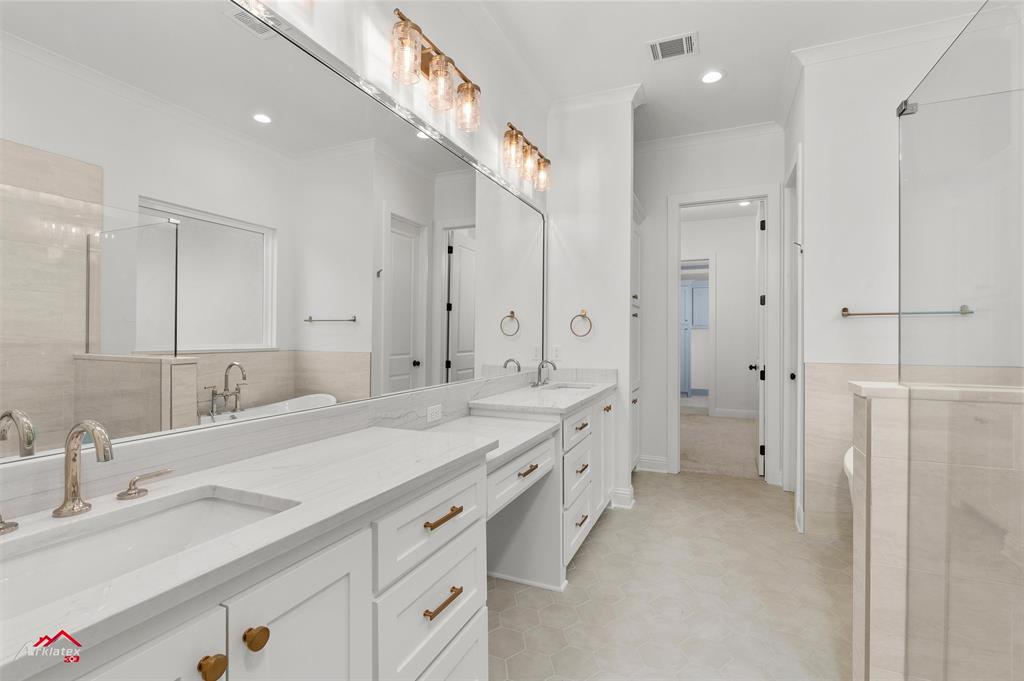 35 Turtle Creek Drive Benton, LA 71006 - Photo 20 of 32 a spacious bathroom with a double vanity sink mirror double and shower