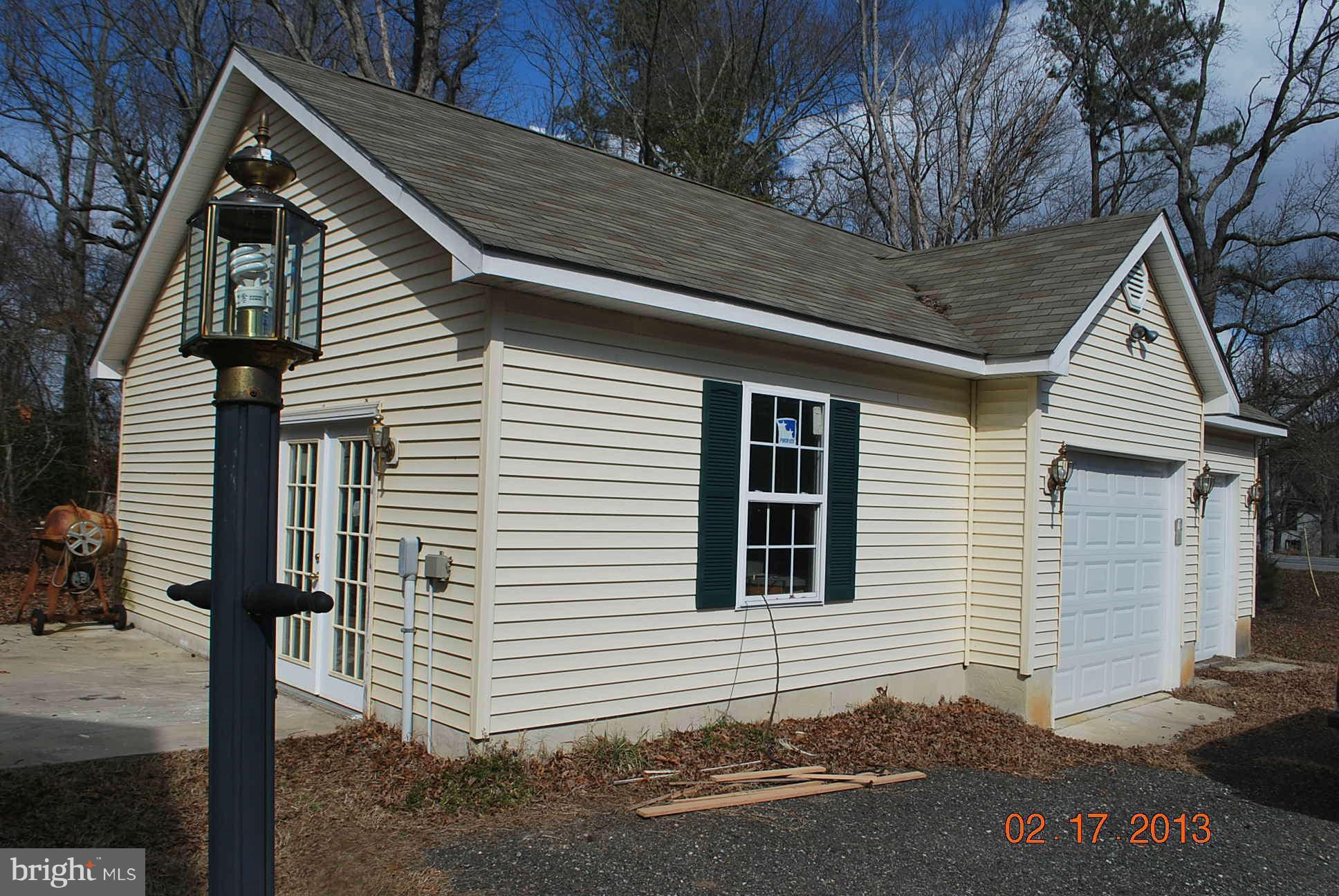 20161 Piney Point Road Callaway, MD 20620 - Photo 13 of 17 a front view of a house with a tree