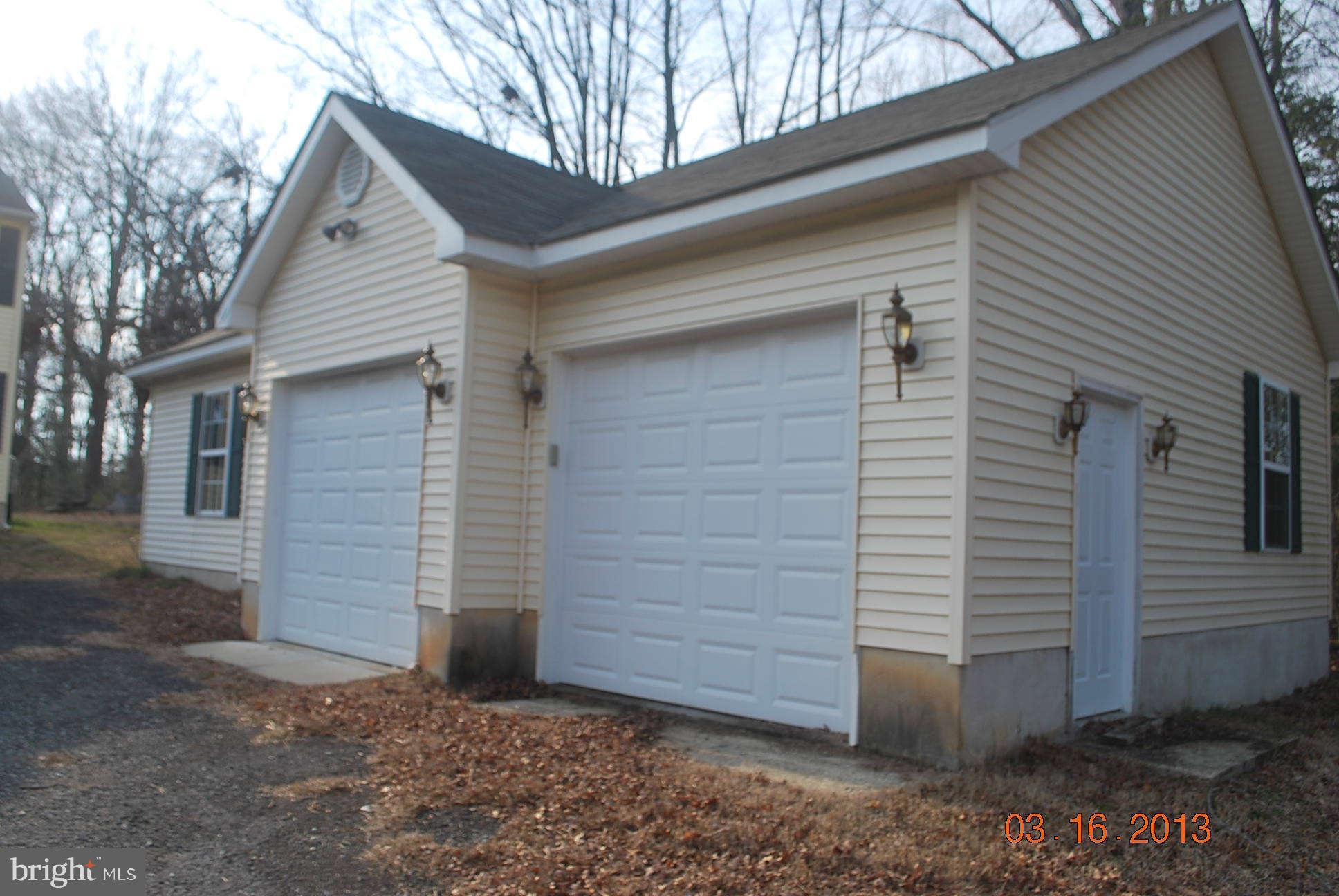 20161 Piney Point Road Callaway, MD 20620 - Photo 14 of 17 a view of a house with a yard
