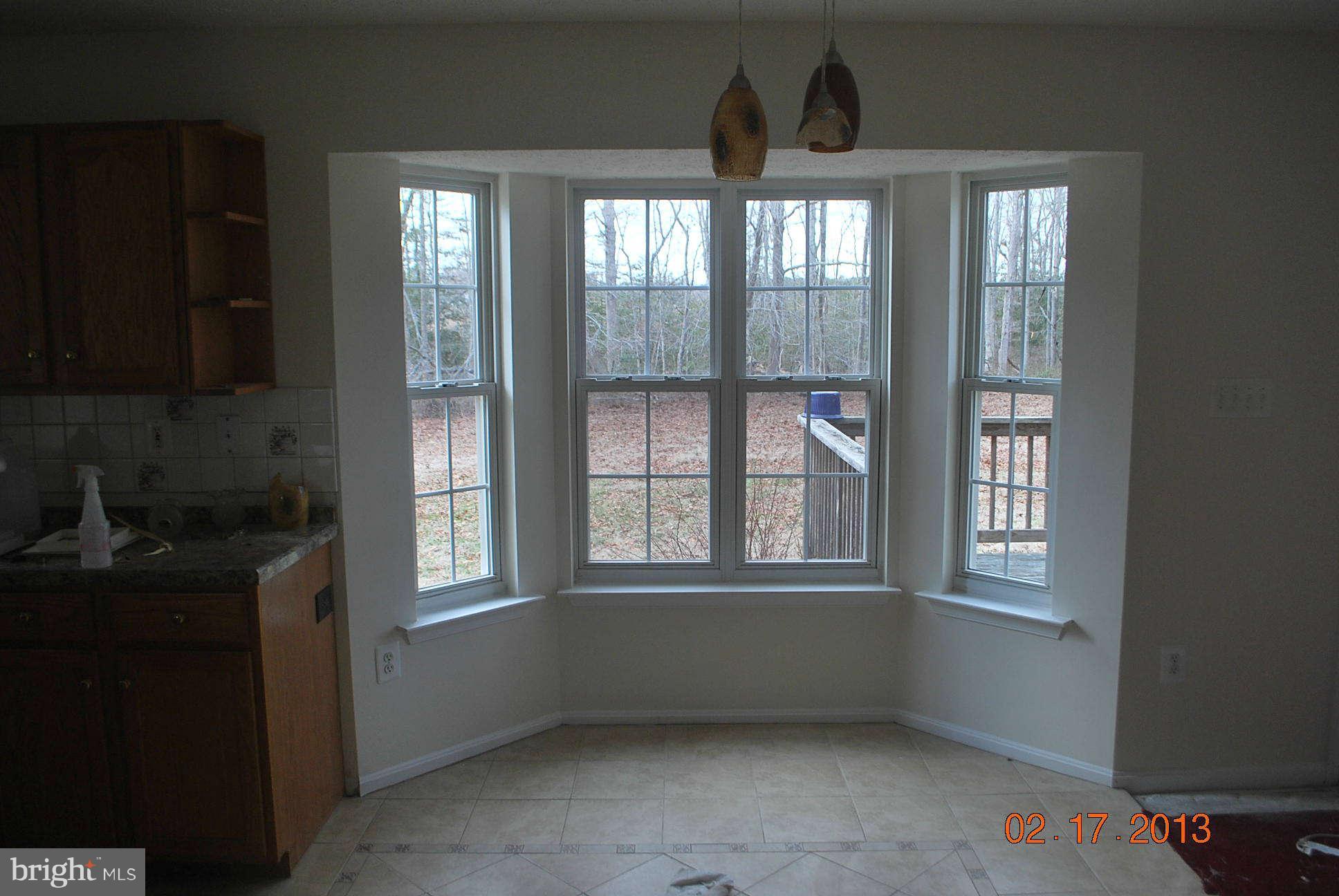20161 Piney Point Road Callaway, MD 20620 - Photo 5 of 17 a view of an empty room with a window
