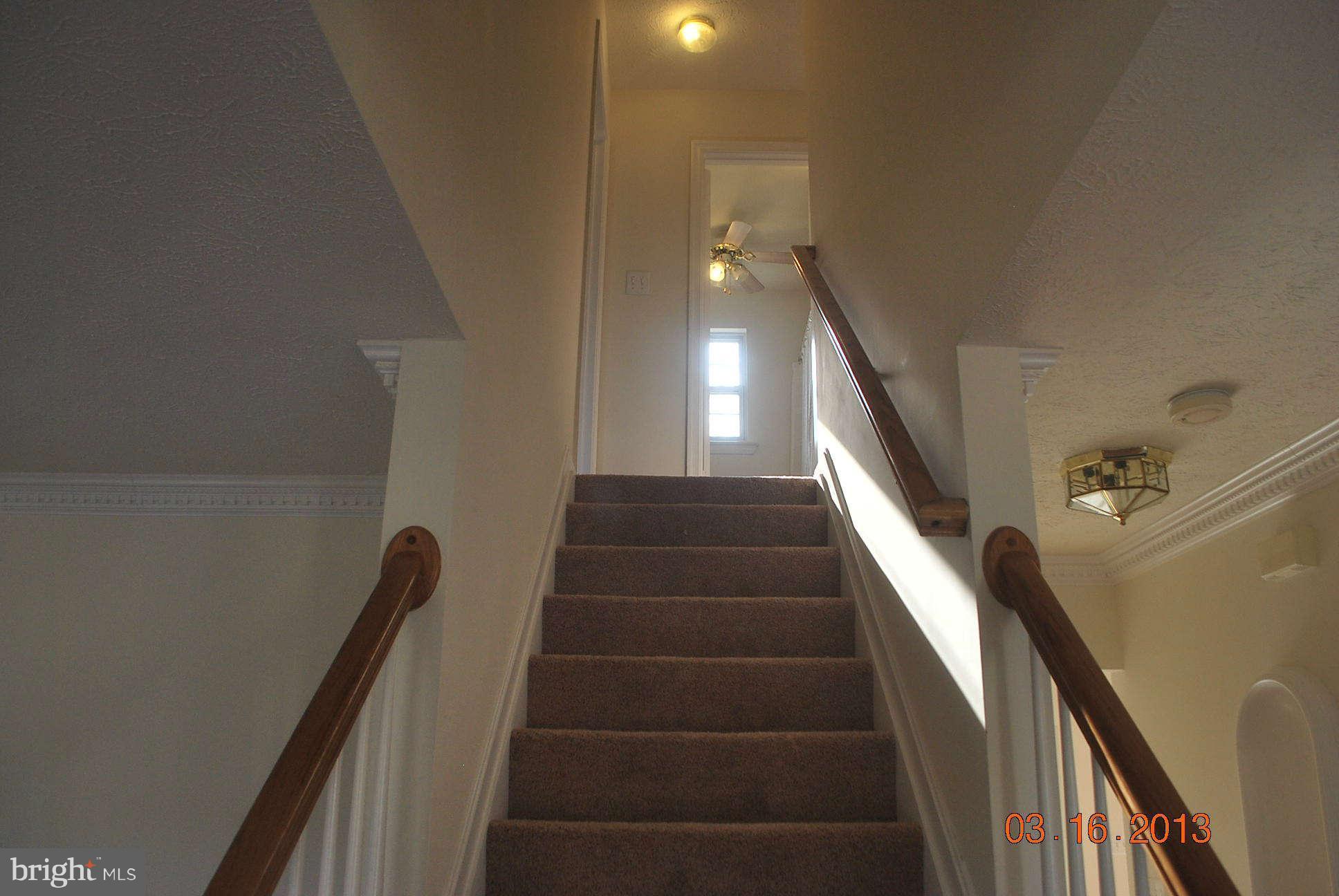 20161 Piney Point Road Callaway, MD 20620 - Photo 7 of 17 a view of entryway and hall with wooden floor