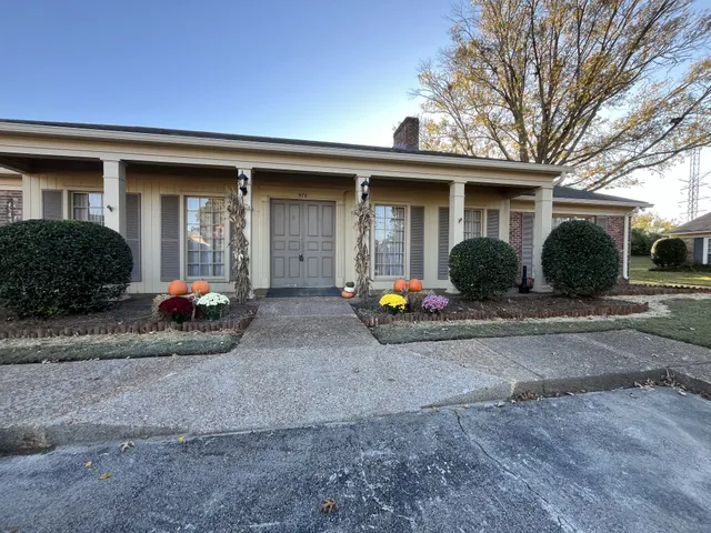 a view of a swimming pool with a lake view