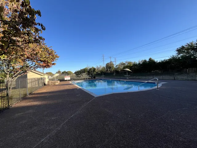 a sign that is sitting on a wooden floor