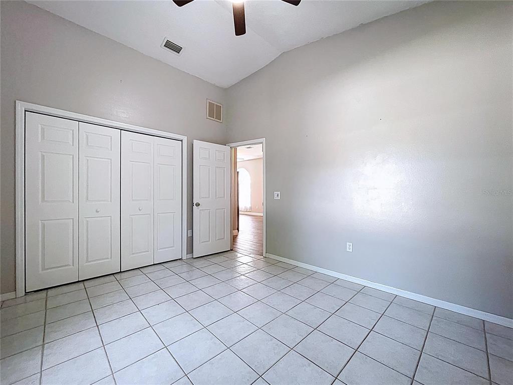 18812 Bascomb Lane Hudson, FL 34667 - Photo 48 of 57 an empty room with windows