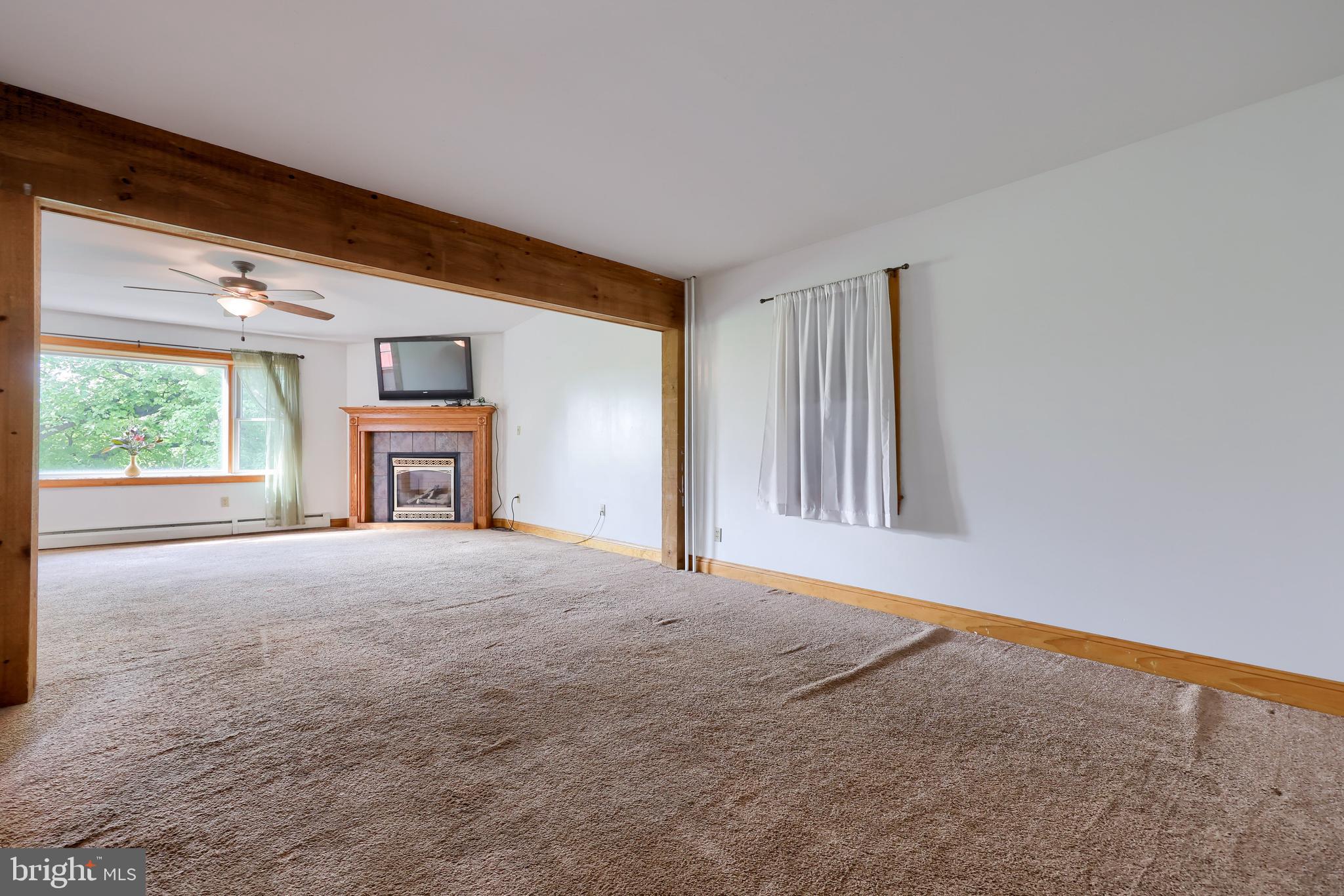 83 Gensinger Road Kutztown, PA 19530 - Photo 23 of 37 Living Room view into Family Room