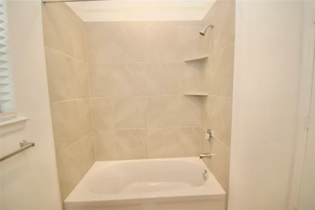 a room with a couch and a window