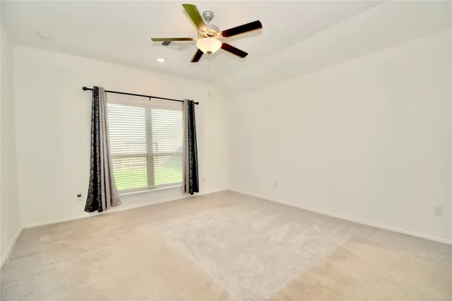 a spacious bathroom with a sink a mirror and a shower