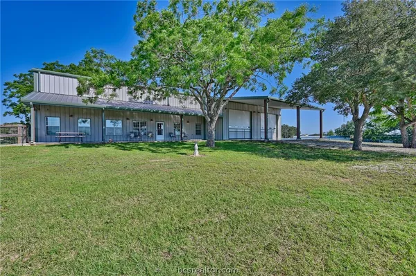 a house view with a garden space