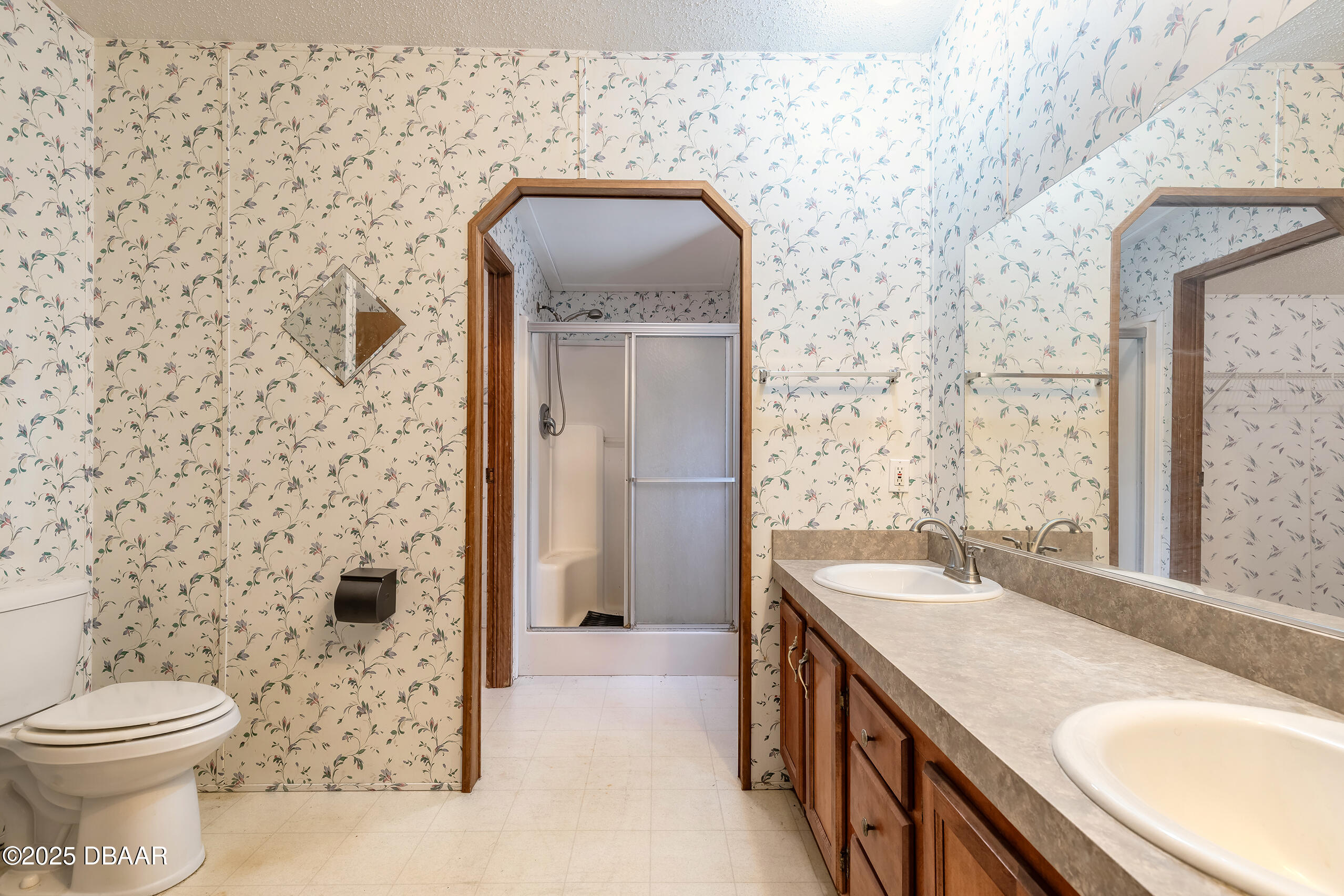 2127 Oak Street Bunnell, FL 32110 - Photo 15 of 48 a bathroom with a sink a toilet and shower