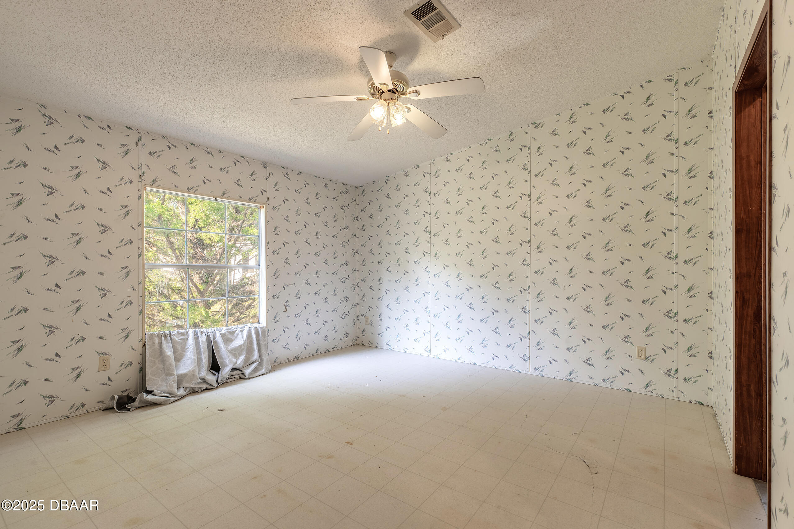 2127 Oak Street Bunnell, FL 32110 - Photo 19 of 48 a view of livingroom with window