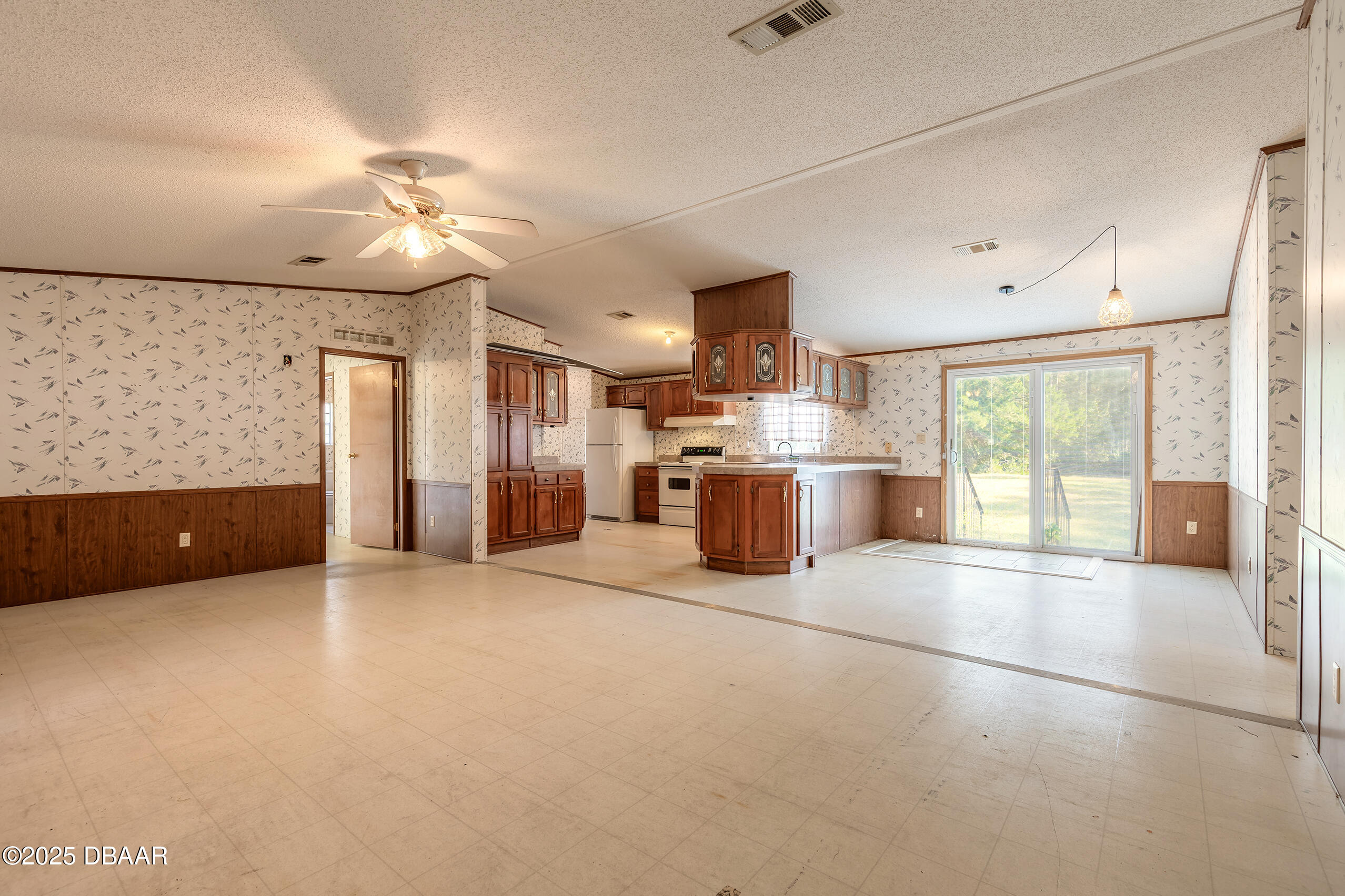 2127 Oak Street Bunnell, FL 32110 - Photo 23 of 48 a view of a kitchen with a sink and a window