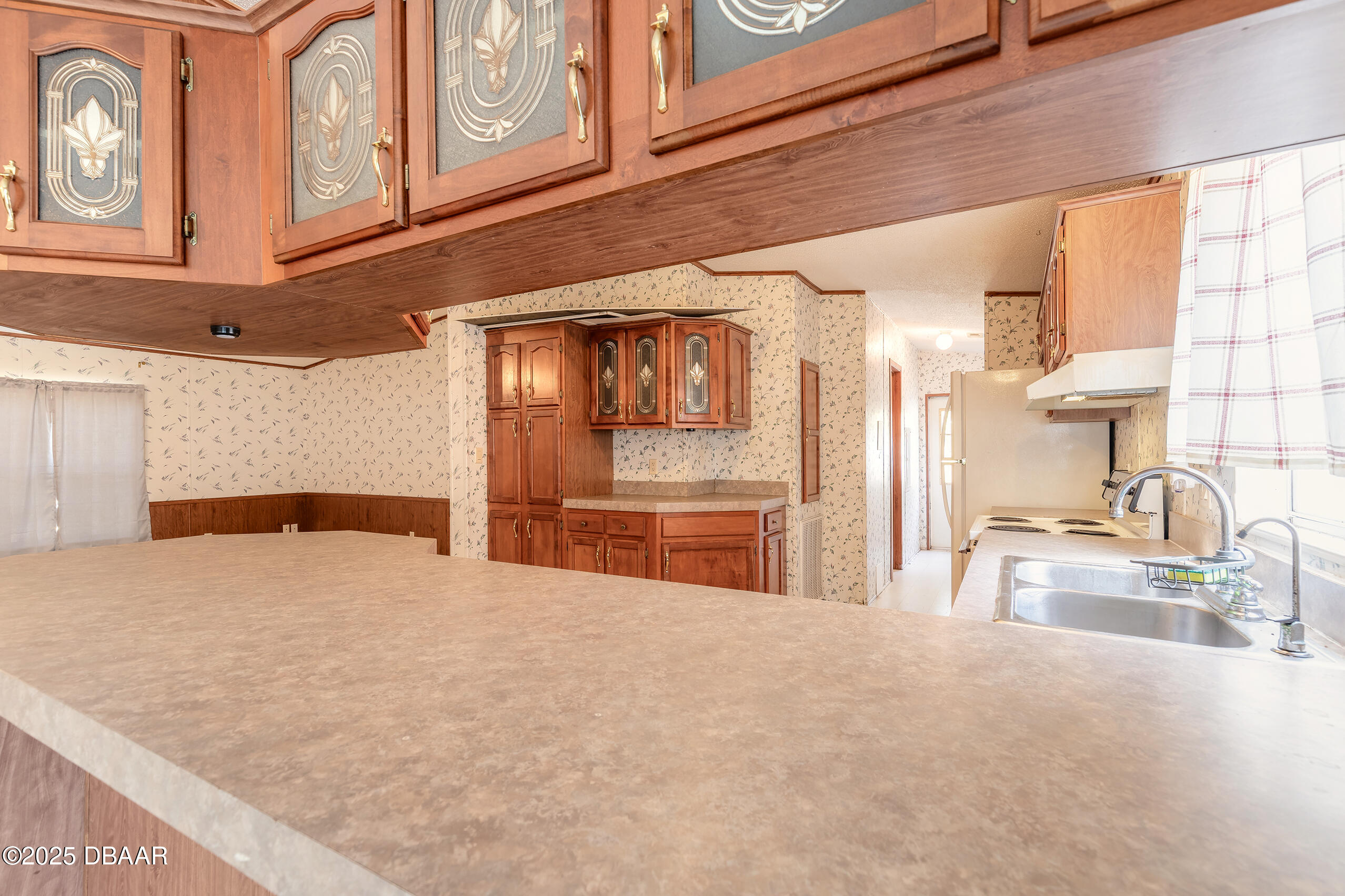 2127 Oak Street Bunnell, FL 32110 - Photo 30 of 48 a view of a kitchen with a sink