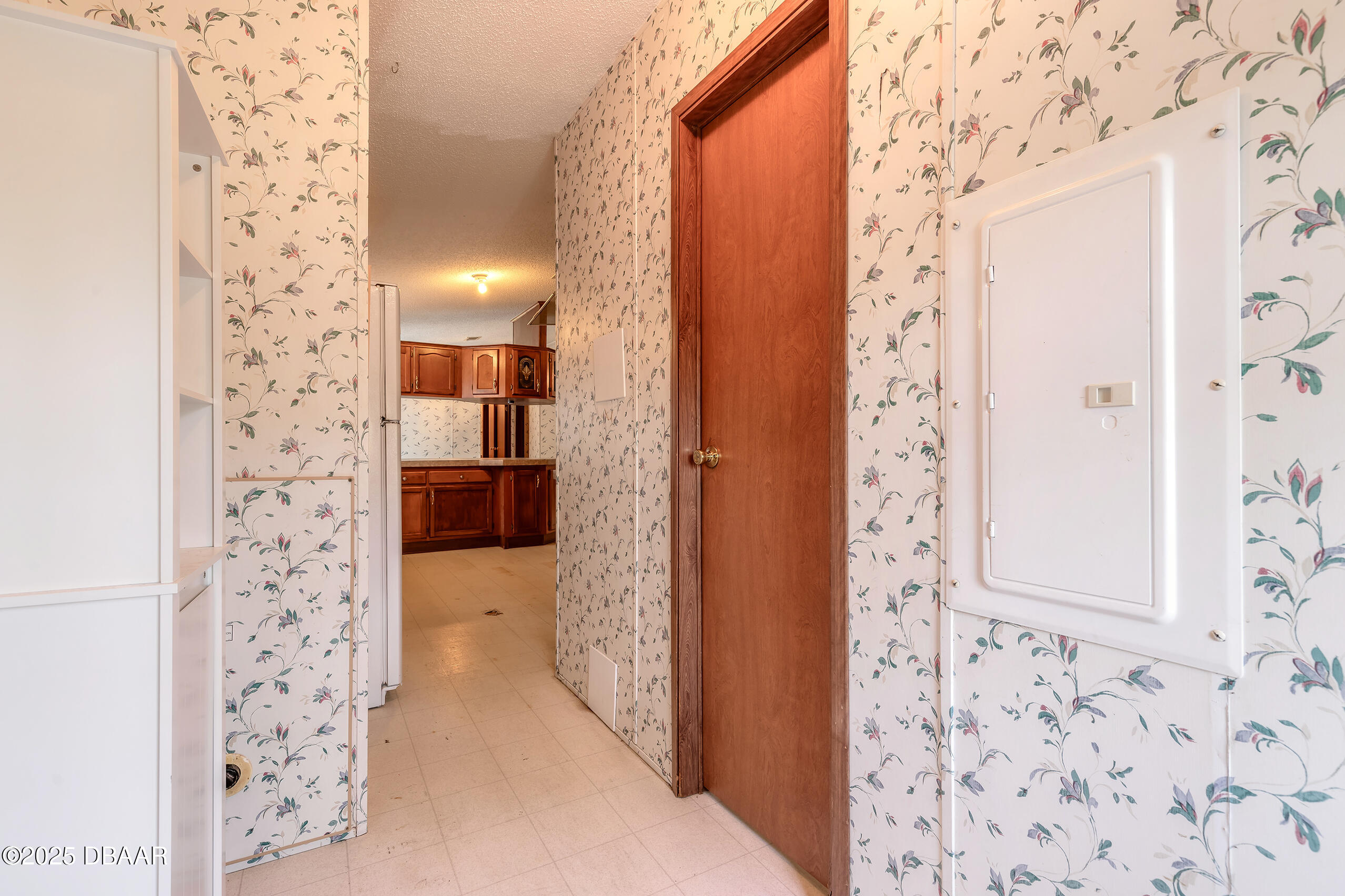 2127 Oak Street Bunnell, FL 32110 - Photo 33 of 48 a view of a bathroom from a hallway