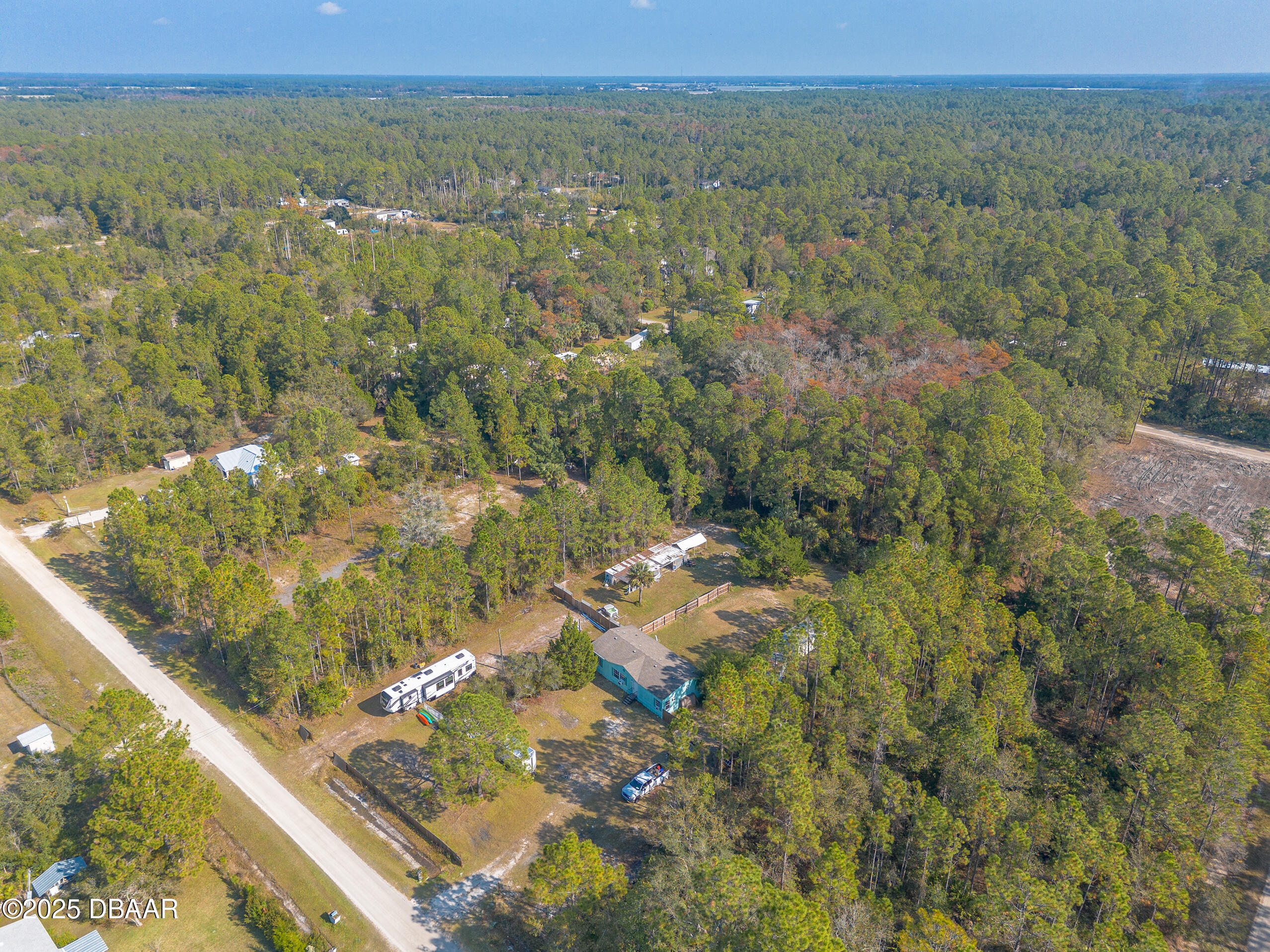 2127 Oak Street Bunnell, FL 32110 - Photo 43 of 48 a view of a city with lush green forest
