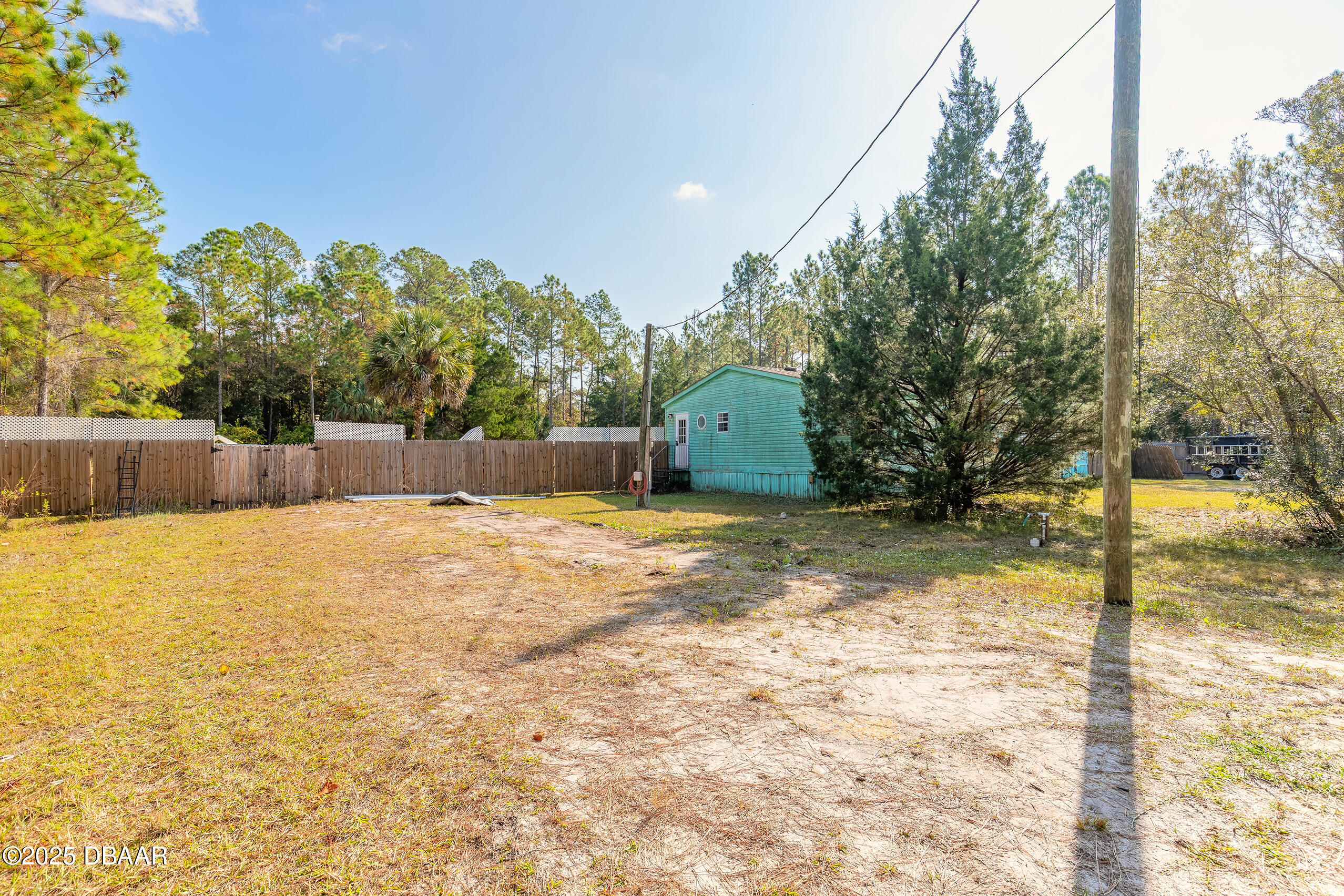 2127 Oak Street Bunnell, FL 32110 - Photo 6 of 48 a view of a backyard