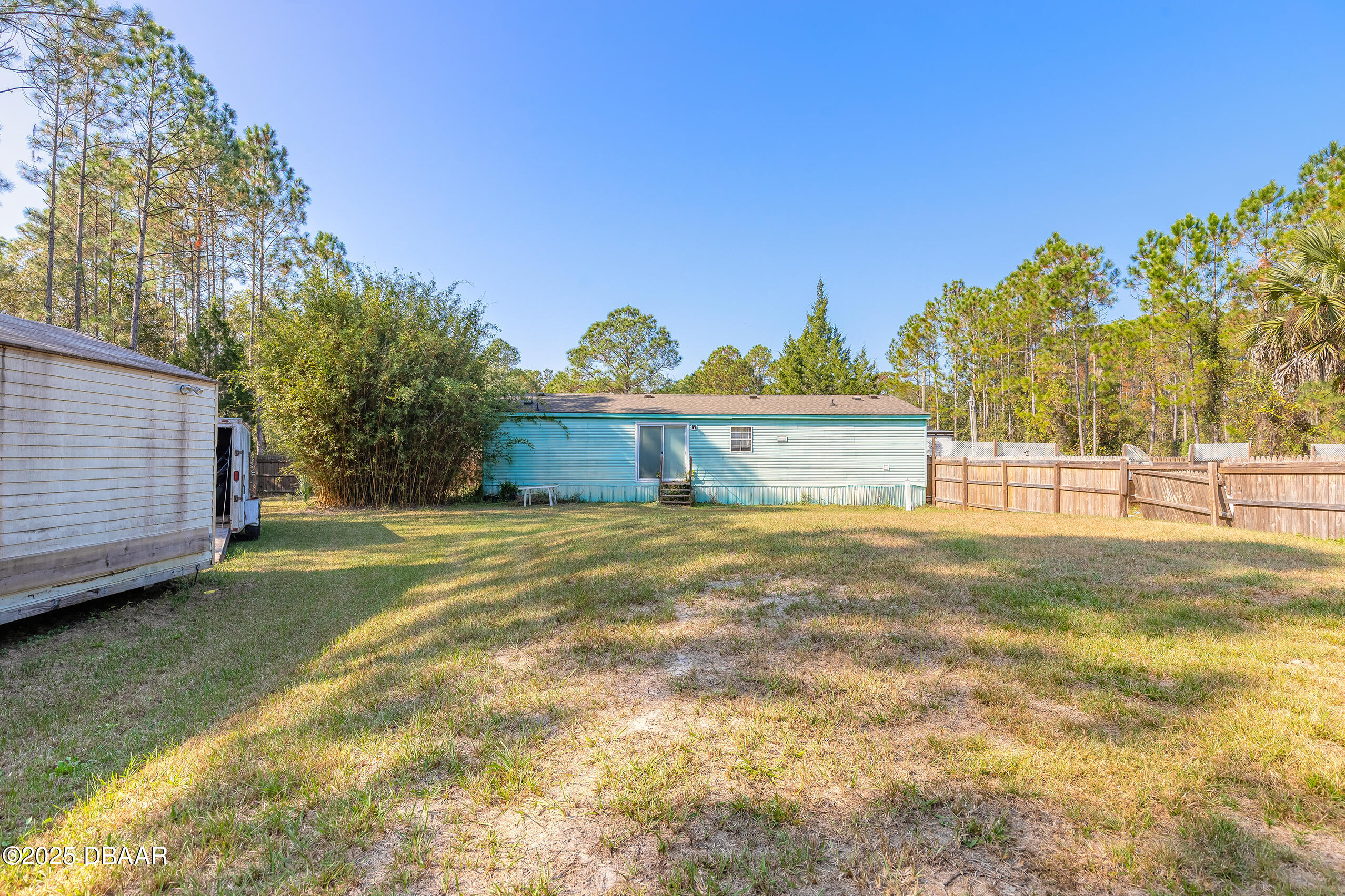 2127 Oak Street Bunnell, FL 32110 - Photo 9 of 48 a view of a yard with a house