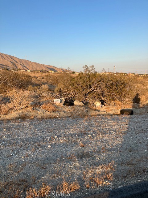 13356 Fremontia Road Whitewater, CA 92282 - Photo 4 of 12 a view of a large building with mountains in the background