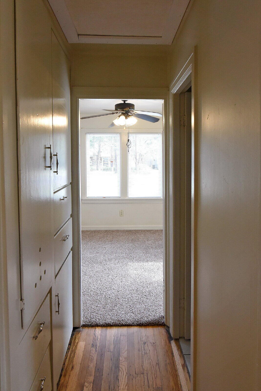 2006 29th Street, Unit FRONT Lubbock, TX 79411 - Photo 6 of 8 a view of hallway with wooden floor