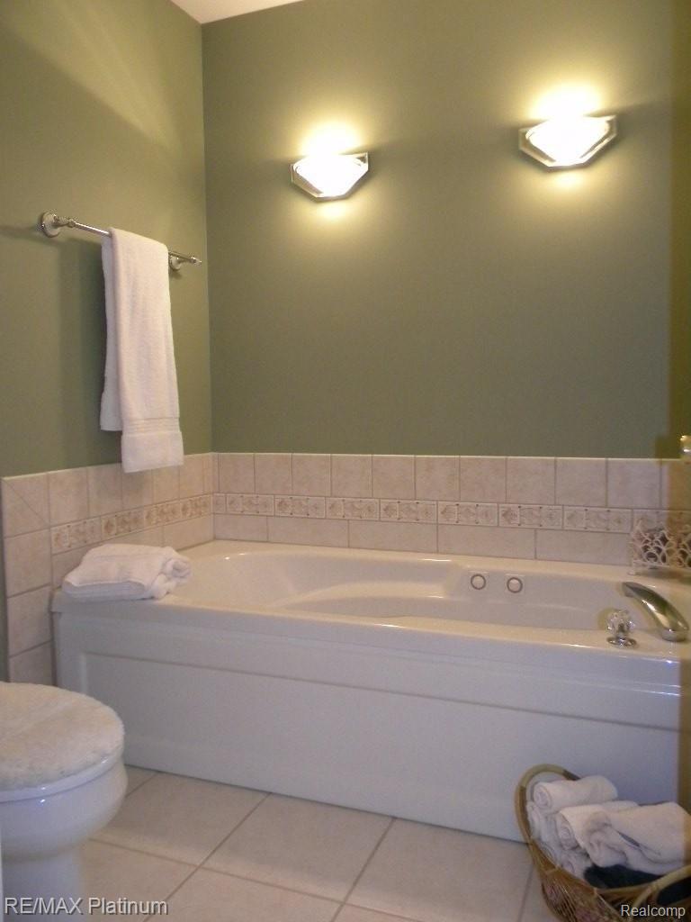 5123 North Fleming Road Fowlerville, MI 48836 - Photo 16 of 25 Relaxing Jetted Tub
