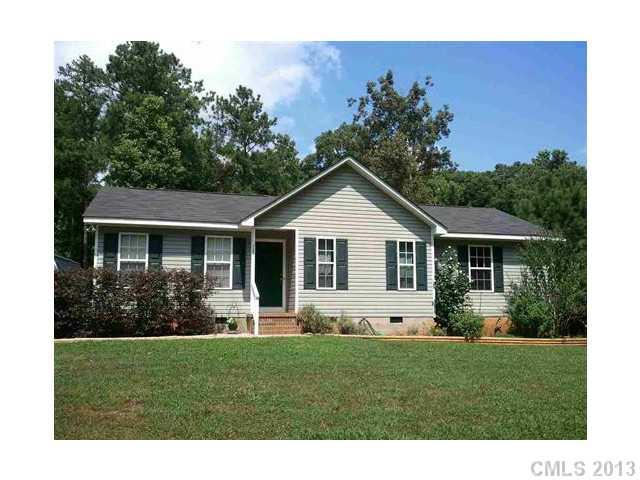 3671 East North Corner Road Lancaster, SC 29720 - Photo 1 of 16 a front view of a house with a yard