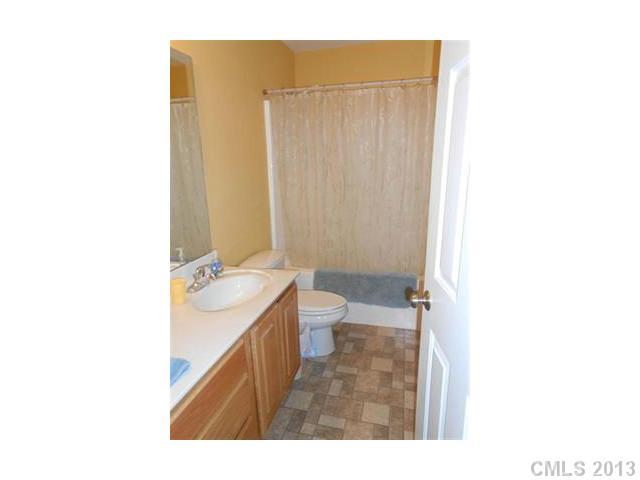 3671 East North Corner Road Lancaster, SC 29720 - Photo 12 of 16 a bathroom with a sink a toilet and shower