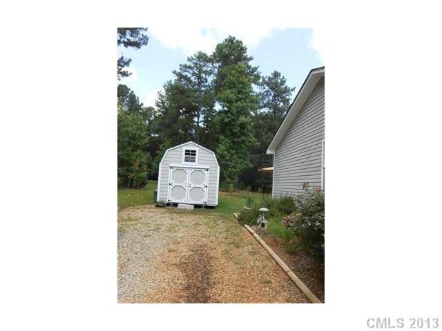 3671 East North Corner Road Lancaster, SC 29720 - Photo 16 of 16 a view of a house with backyard