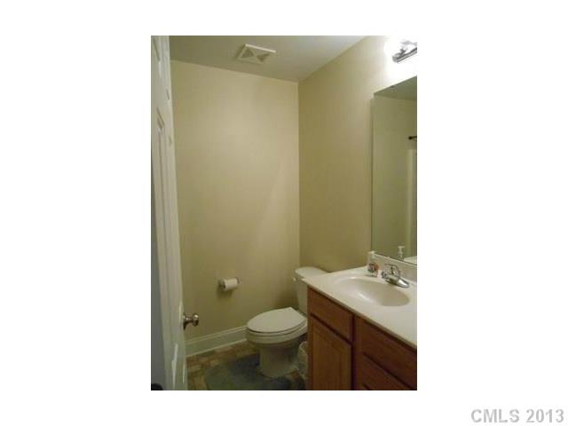 3671 East North Corner Road Lancaster, SC 29720 - Photo 10 of 16 a bathroom with a sink and a mirror