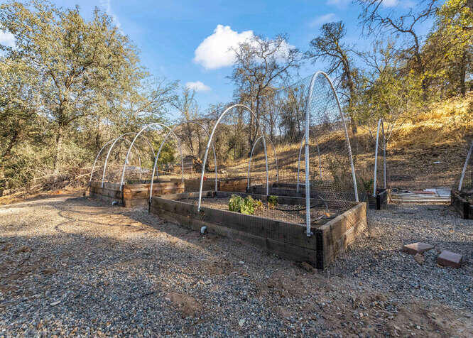 40861 Ferndale Drive Three Rivers, CA 93271 - Photo 39 of 49 a view of a backyard with iron fence