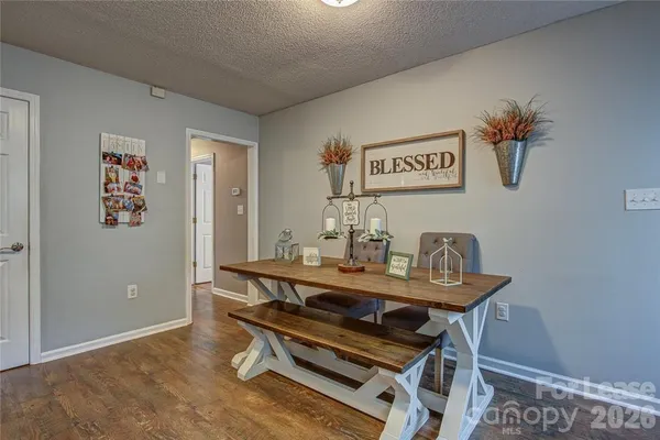 a view of a workspace with furniture