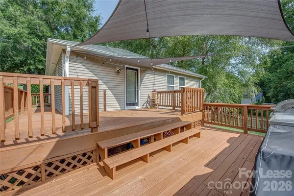 a view of a chairs on the roof deck