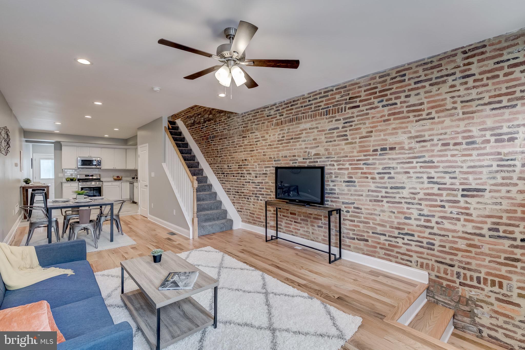 3140 Keswick Road Baltimore, MD 21211 - Photo 48 of 49 Open floor plan and lots of exposed brick