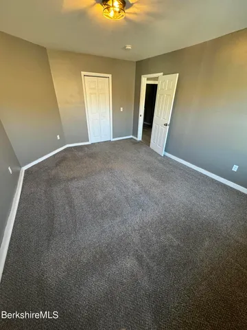 a view of a livingroom with a fireplace
